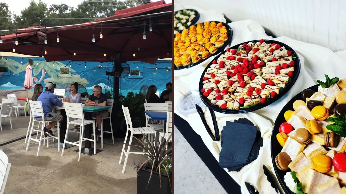 Outdoor tables beside a seafood restaurant entrance.